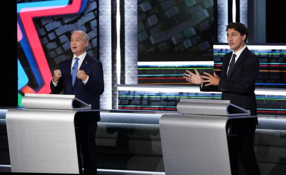Sean Kilpatrick - THE CANADIAN PRESS
Conservative Leader Erin O’Toole, left, and Liberal Leader Justin Trudeau speak during Wednesday’s French-language federal leaders’ debate.