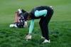Gerald Herbert - AP
Co-leader Tommy Fleetwood marks his ball on the fourth fairway after play was suspended by darkness at The Players Championship on Saturday.
