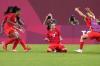 Fernando Vergara - AP
Canada's Jessie Fleming (centre) celebrates scoring the opening goal from the penalty spot during their women's semifinal soccer match against United States at the Tokyo Olympics in Kashima, Japan.