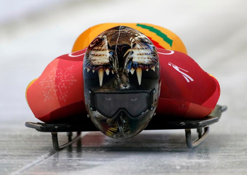 Andy Wong - AP
Ghanaian skeleton athlete Akwasi Frimpong, seen here in competition the Pyeongchang Games on Feb. 15, 2018, barely missed qualification for Beijing.