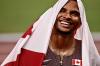 JEFF PACHOUD - AFP via GETTY IMAGES
Andre De Grasse was all smiles under the Canadian flag after winning the gold medal in the men’s 200 in Tokyo.