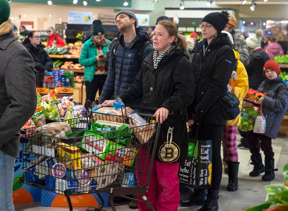 Andrew Vaughan - THE CANADIAN PRESS
Customers line up at a Sobeys grocery store in St. John's on Tuesday, January 21, 2020.