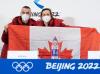 Ryan Remiorz - THE CANADIAN PRESS
Speedskater Charles Hamelin and hockey player Marie-Philip Poulin hold up the Canadian flag after being named as flag-bearers at the news conference Wednesday for the 2022 Winter Olympics in Beijing.