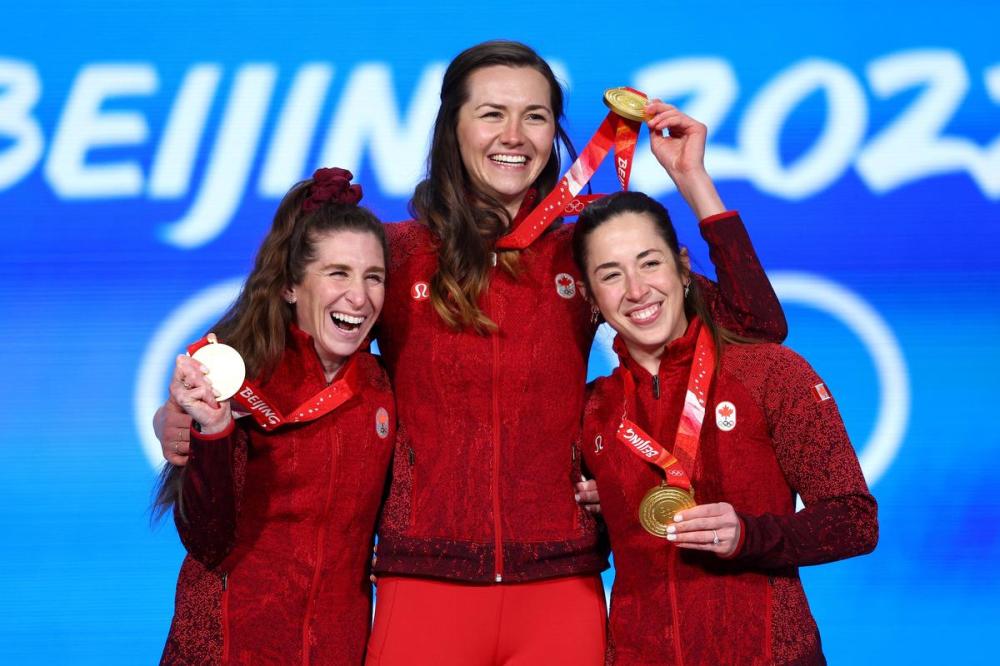 Elsa - GETTY IMAGES
Gold medallists Ivanie Blondin, Isabelle Weidemann and Valerie Maltais of Team Canada pose with their medals Tuesday in Beijing.