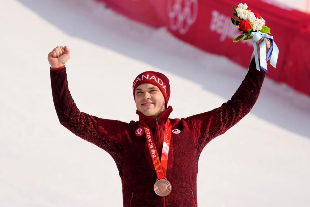 Luca Bruno - AP
Toronto’s James Crawford celebrates his bronze during the medal ceremony for the men's combined at the 2022 Winter Olympics.