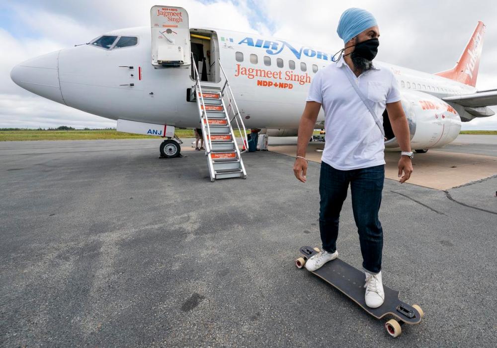 JONATHAN HAYWARD - THE CANADIAN PRESS
NDP Leader Jagmeet Singh rides his longboard on the tarmac in Halifax, N.S. on Sept. 17, 2021.