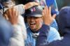 Tony Dejak - The Associated Press
Blue Jay Joe Panik soaks up the celebration after his first home run of the season on a rainy night in Cleveland.