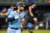 Julio Cortez - The Associated Press
Blue Jay Bo Bichette sneaks a peek before rounding the bases following his two-run homer in the sixth inning of Wednesday night’s win in Baltimore.