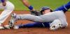 Charlie Riedel - The Associated Press
Blue Jay Cavan Biggio held the bag but didn’t beat the tag from the Royals’ Whit Merrifield while trying to steal second in the sixth inning of Saturday’s second game.