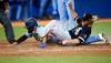 Vaughn Ridley - Getty Images
Blue Jay Breyvic Valera scores past sliding White Sox reliever Craig Kimbrel, who uncorked a wild pitch in the eighth inning of Monday night’s game at the Rogers Centre.
