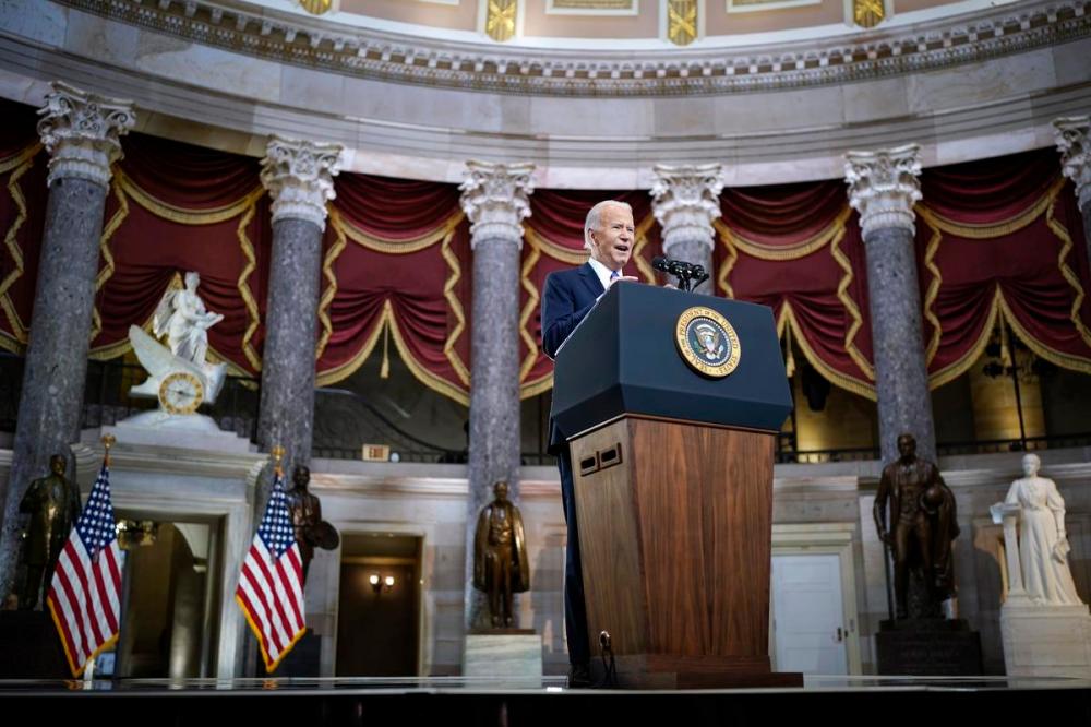 Drew Angerer - AP
U,S, President Joe Biden speaks from Statuary Hall at the Capitol in Washington on Jan. 6, 2022, to mark the one year anniversary of the Jan. 6 riot there by supporters of then-president Donald Trump.