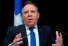 Quebec Premier Francois Legault announces the number of victims during a news conference on the COVID-19 pandemic, Thursday, April 30, 2020 at the legislature in Quebec City. THE CANADIAN PRESS/Jacques Boissinot