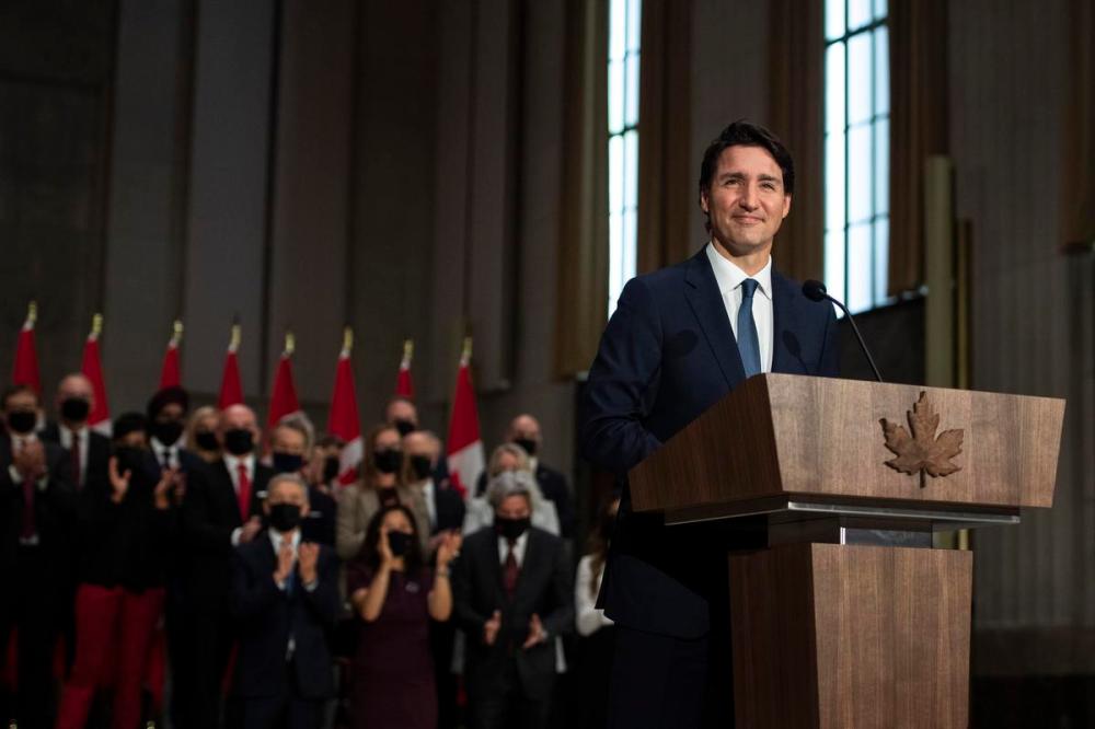Justin Tang - THE CANADIAN PRESS
Members of the federal cabinet applaud as Prime Minister Justin Trudeau tells a reporter that he will lead his party in the next election, at a news conference after the federal cabinet was sworn in on Oct. 26, 2021 in Ottawa.