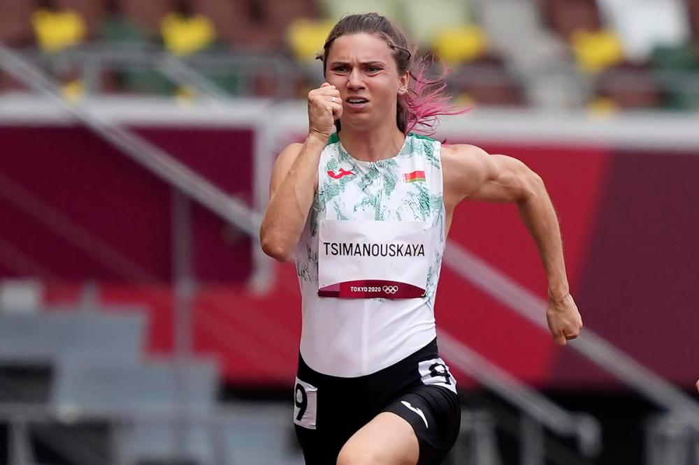 Martin Meissner - AP
Krystsina Tsimanouskaya, of Belarus, runs in the women's 100 metres at the 2020 Tokyo Olympics on Friday.