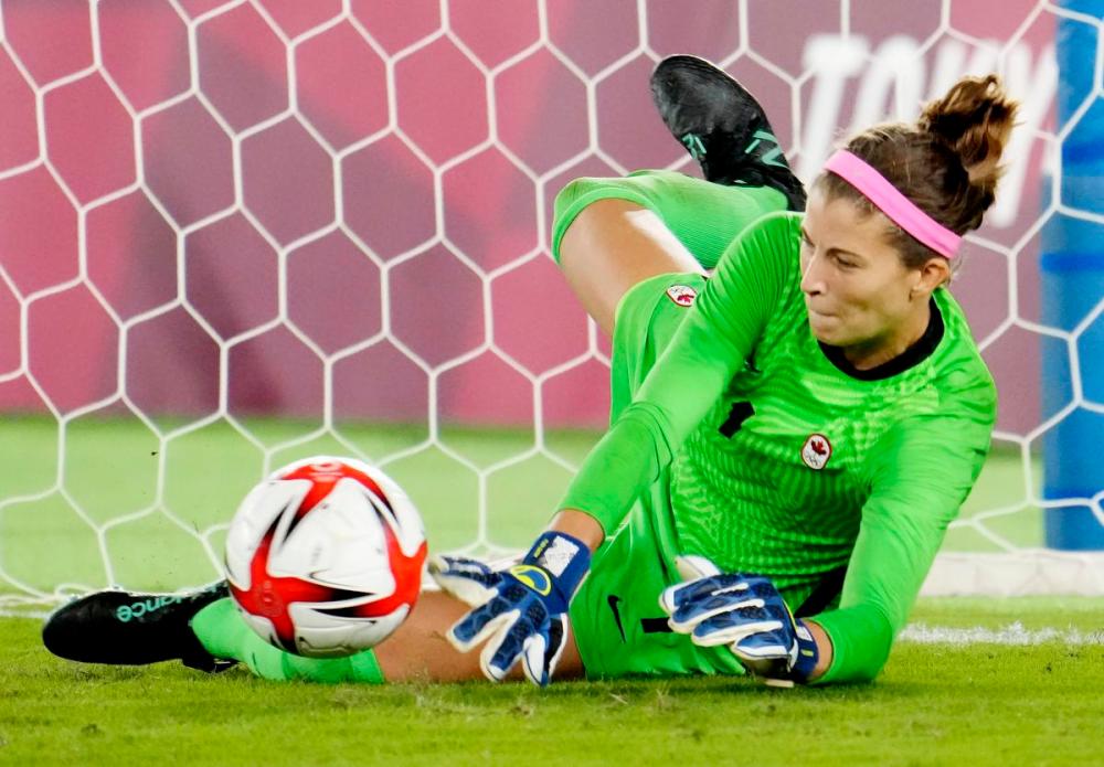 Frank Gunn - THE CANADIAN PRESS
Canadian Stephanie Labbé makes a crucial save in the sixth round of a shootout against Sweden in Friday’s Olympic gold-medal match.