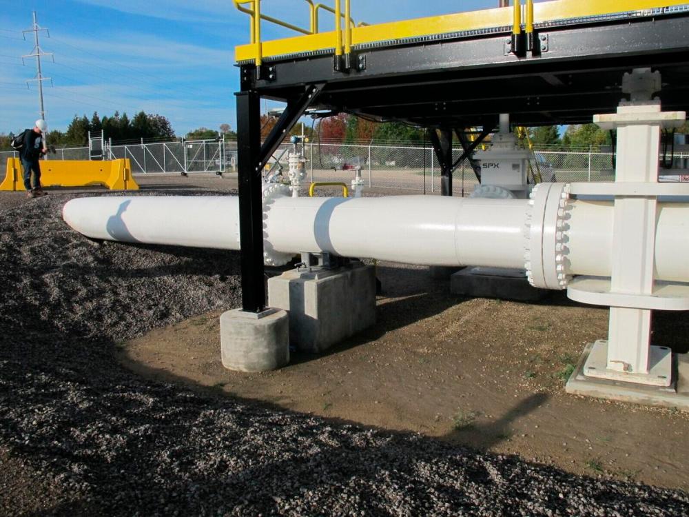 John Flesher - AP
This photo taken in October 2016 shows an above-ground section of Enbridge's Line 5 at the Mackinaw City, Mich., pump station. Michigan Gov. Gretchen Whitmer has ordered the pipeline shut down because of concerns about a potential spill in the channel that connects Lake Huron and Lake Michigan. Enbridge is resisting the order with the support of Canadian officials who say Line 5 is essential to their economy. The disagreement comes months after U.S. President Joe Biden upset Canada by canceling the Keystone XL oil pipeline project.