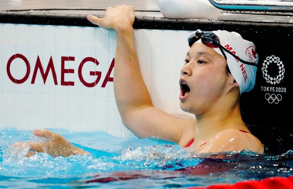 Frank Gunn - THE CANADIAN PRESS
It took a few seconds for Canada's Maggie Mac Neil to see her result in the women's 100-metre butterfly final. She won.