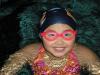 - Family handout
A nine-year-old Maggie Mac Neil, wearing a London Aquatic Club swim cap in 2009. 