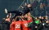Robert ATANASOVSKI - AFP via GETTY IMAGES
North Macedonia coach Blagoja Milevski is lifted by his players after a 3-1 win over Iceland ensured the Macedonians would advance to the European playoffs, where 12 teams will compete for the last three European berths at the 2022 World Cup in Qatar.