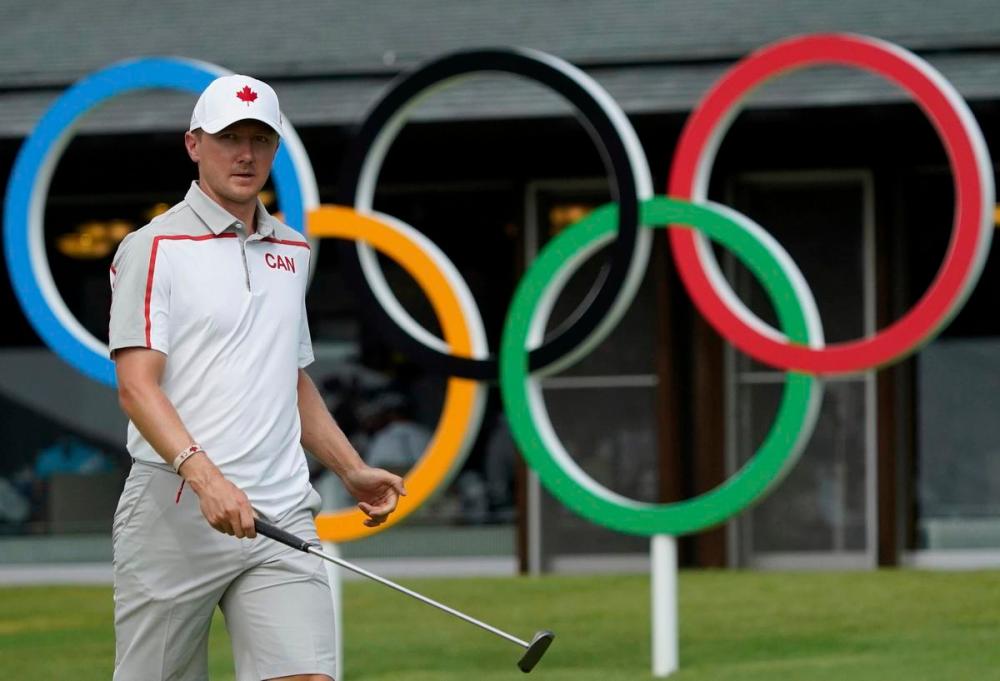 Matt York - AP
Canada's Mackenzie Hughes practises with his putter during a practice round of the men's golf event at the 2020 Summer Olympics on Tuesday.