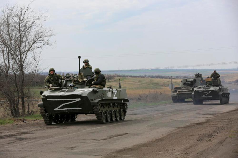 Alexei Alexandrov - The Associated Press
Russian military vehicles move on a highway near Mariupol on Monday.