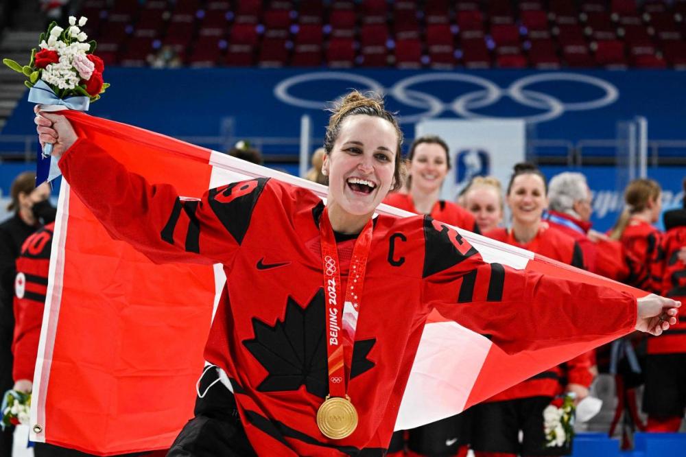 GABRIEL BOUYS - AFP via GETTY IMAGES
Marie-Philip Poulin added to her legend with two goals and an assist in the final, winning her third Olympic medal.