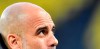Manchester City's head coach Pep Guardiola looks up before the Champions League quarterfinal second leg soccer match between Borussia Dortmund and Manchester City at the Signal Iduna Park stadium in Dortmund, Germany, Wednesday, April 14, 2021. (AP Photo/Martin Meissner, Pool)