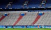 Schalke's team warms up prior the German Bundesliga soccer match between FC Schalke 04 and VfL Wolfsburg in Gelsenkirchen, Germany, Saturday, June 20, 2020. Because of the coronavirus outbreak all soccer matches of the German Bundesliga take place without spectators. (AP Photo/Martin Meissner, Pool)