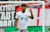 Bayern's Kingsley Coman reacts after he scored Bayern's 2nd goal during the German Bundesliga soccer match between 1. FC Cologne and Bayern Munich in Cologne, Germany, Sunday, Feb. 16, 2020. (AP Photo/Martin Meissner)