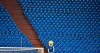 Schalke's mascot watches from the empty tribune during the German Bundesliga soccer match between FC Schalke 04 and Bayern Munich in Gelsenkirchen, Germany, Sunday, Jan. 24, 2021. (AP Photo/Martin Meissner, Pool)