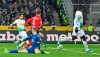 Moenchengladbach's Patrick Herrmann, left, scores his side's third goal after an assist from Moenchengladbach's Breel Embolo, right, during the German Bundesliga soccer match between Borussia Moenchengladbach and SC Freiburg in Moenchengladbach, Germany, Sunday, Dec. 1, 2019. (AP Photo/Martin Meissner)