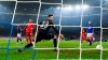 Schalke's goalkeeper Markus Schubert receives the opening goal by Bayern's Joshua Kimmich during the German soccer cup, DFB Pokal, quarter-final match between FC Schalke 04 and Bayern Munich in Gelsenkirchen, Germany, Tuesday, March 3, 2020. (AP Photo/Martin Meissner)