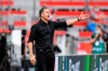 Mainz head coach Achim Beierlorzer reacts during the German Bundesliga soccer match between Bayer 04 Leverkusen and FSV Mainz 05 in Leverkusen, Germany, Saturday, June 27, 2020. Because of the coronavirus outbreak all soccer matches of the German Bundesliga take place without spectators. (AP Photo/Martin Meissner, Pool)