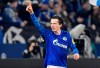 Schalke's Michael Gregoritsch celebrates after scoring his side's second goal during the German Bundesliga soccer match between FC Schalke 04 and Borussia Moenchengladbach at the Arena in Gelsenkirchen, Germany, Friday, Jan. 17, 2020. (AP Photo/Martin Meissner)