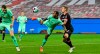 Moenchengladbach's Valentino Lazaro, center, scores an artistic third goal for his side beside Leverkusen's Sven Bender, right, during the German Bundesliga soccer match between Bayer Leverkusen and Borussia Moenchengladbach at the BayArena in Leverkusen, Germany, Saturday, Nov. 8, 2020. (AP Photo/Martin Meissner, Pool)