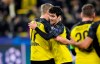 Dortmund's Giovanni Reyna, right, embraces Dortmund's Erling Braut Haaland after the Champions League round of 16 first leg soccer match between Borussia Dortmund and Paris Saint Germain in Dortmund, Germany, Tuesday, Feb. 18, 2020. Reyna is the youngest American ever playing in Champions League. (AP Photo/Martin Meissner)