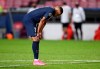PSG's Kylian Mbappe stands on the pitch disappointed after losing the Champions League final soccer match between Paris Saint-Germain and Bayern Munich at the Luz stadium in Lisbon, Portugal, Sunday, Aug. 23, 2020. (David Ramos/Pool via AP)