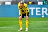 Dortmund's Erling Haaland, center, pauses after missing a scoring chance during the German Bundesliga soccer match between Borussia Dortmund and Eintracht Frankfurt in Dortmund, Germany, Saturday, April 3, 2021. (AP Photo/Martin Meissner, Pool)