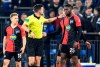 Referee Harm Osmers showed the red card to Berlin's Jordan Torunarigha, right, during the German soccer cup, DFB Pokal, match between FC Schalke 04 and Hertha BSC Berlin in Gelsenkirchen, Germany, Tuesday, Feb. 4, 2020. (AP Photo/Martin Meissner)