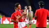 Bayern's Robert Lewandowski holds the trophy after the Champions League final soccer match between Paris Saint-Germain and Bayern Munich at the Luz stadium in Lisbon, Portugal, Sunday, Aug. 23, 2020. (David Ramos/Pool via AP)