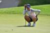 KAZUHIRO NOGI - AFP via GETTY IMAGES
USA's Nelly Korda sets up her putt on the 18th green in Round 3 of the women’s golf individual stroke play at the Tokyo Olympics.