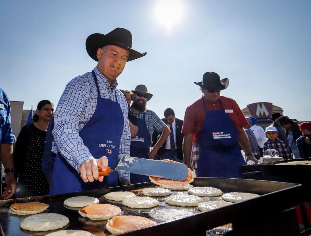 Jeff McIntosh - THE CANADIAN PRESS
Conservative Leader Erin O'Toole attends a Stampede pancake breakfast in Calgary on July 10.