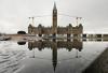 Adrian Wyld - THE CANADIAN PRESS
The Centre Block of Parliament Hill is reflected in water, Thursday, March 24, 2022 in Ottawa.
