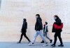 Shoppers walk past boarded up stores on Montreal's Sainte-Catherine street on Wednesday, June 3, 2020. A number of shops remain closed after being allowed to reopen last week. THE CANADIAN PRESS/Paul Chiasson
