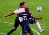 Vancouver Whitecaps goalkeeper Bryan Meredith kicks the ball way from Montreal Impact midfielder Emanuel Maciel during second half MLS action in Montreal on Tuesday, August 25, 2020. THE CANADIAN PRESS/Paul Chiasson