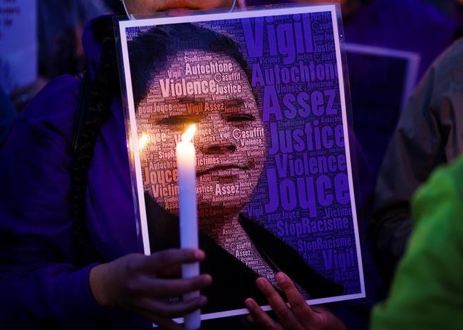 A picture of Joyce Echaquan is seen during a vigil in front of the hospital where she died in Joliette, Que. on Tuesday, September 29, 2020. THE CANADIAN PRESS/Paul Chiasson