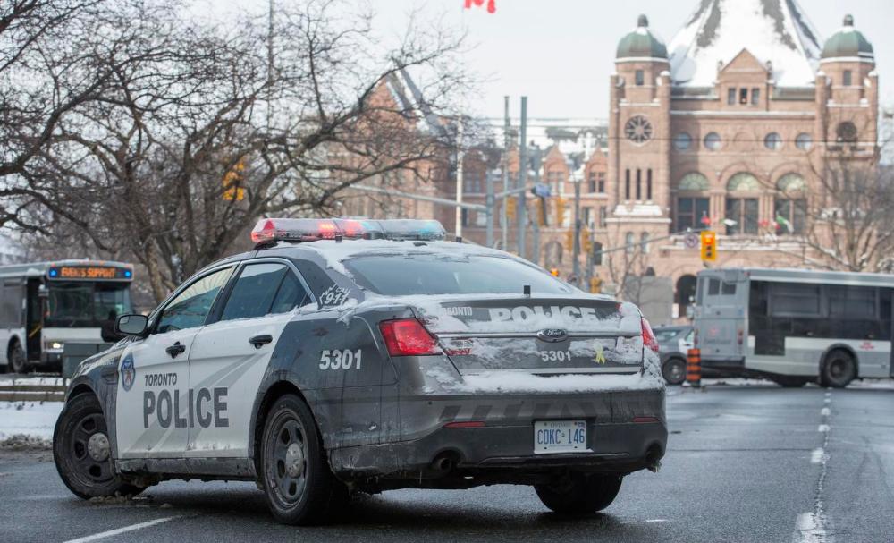 Rick Madonik - Toronto Star
TPS vehicles close of University Avenue just south of College Street in advance of the protest planned for tomorrow by anti-mandate citizens.