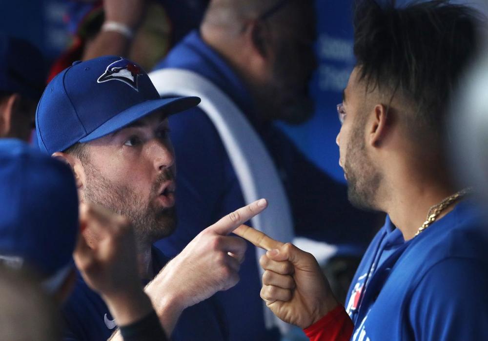 Steve Russell - Toronto Star
Blue Jays starter Robbie Ray makes a point with left-fielder Lourdes Gurriel Jr. after the seventh inning of Wednesday’s win over the Rays.