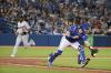 Richard Lautens - Toronto Star
The Tigers’ Willi Castro scores the winning run in the 10th inning as Blue Jays catcher Reese McGuire heads up the first-base line to track down the throw from left-fielder Lourdes Gurriel Jr.