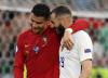 Franck Fife - The Associated Press
Portugal star Cristiano Ronaldo and French striker Karim Benzema did all the scoring in Wednesday’s rematch of the 2016 Euro final, and weren’t afraid to show their friendship.